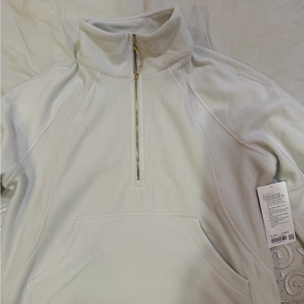 Scuba Tumbled Fleece Funnel-
Neck Half Zip
Colour Bone/Gold
Size XL/XXL - Picture 3 of 10